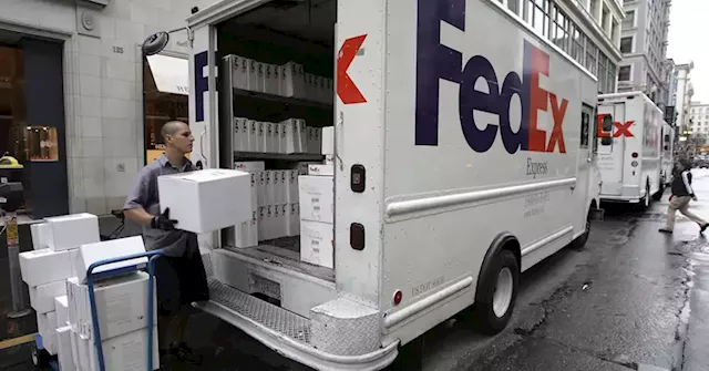 FedEx shares plunge 7% as company cuts forecast, warning of economic slowdown