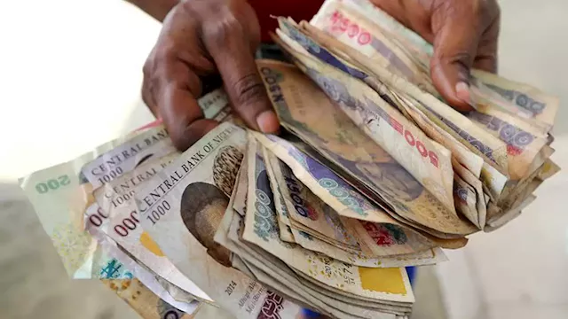 Naira loses at official market