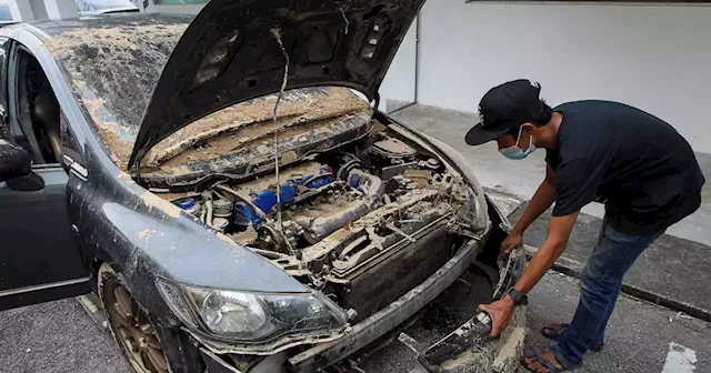 Flood victims can claim money back if car repairs done at workshops not registered with Finance Ministry | New Straits Times