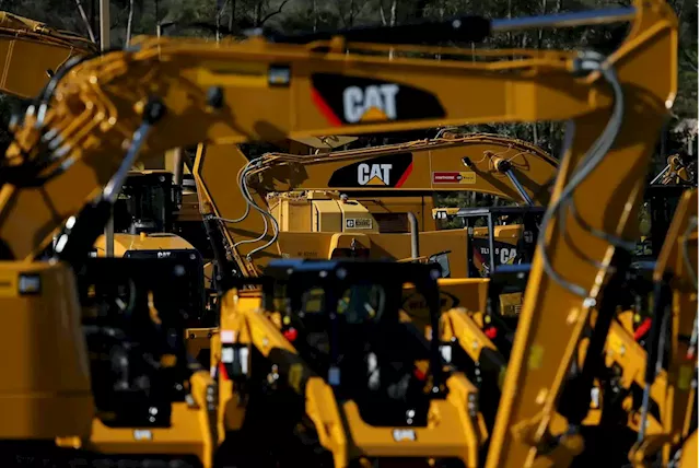 Caterpillar results top Wall Street estimates, but company warns of margin pressure