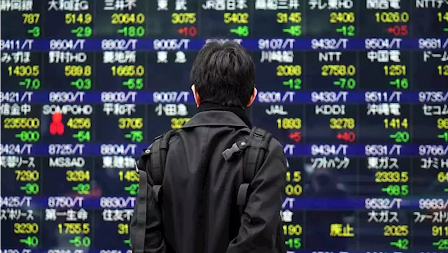 Asian stocks follow Wall Street higher at start of holiday week