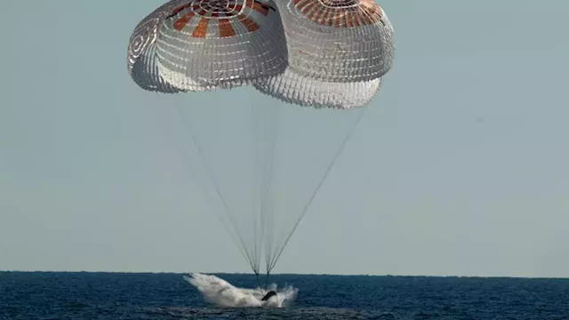 Astronauts returning home from space station splash down off Florida coast | CNN Business