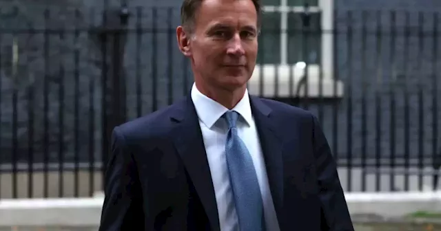 UK's new finance minister admits taxes to rise as PM reels