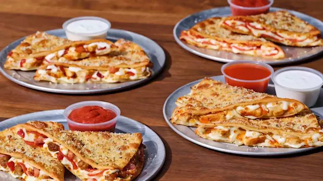 Pizza Hut is finally selling slices — with a twist | CNN Business