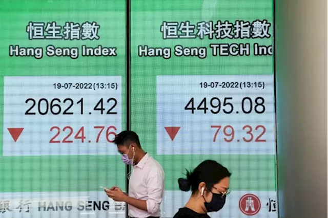 Asian stocks down to 2-1/2-year lows, pound lifted by Sunak’s victory