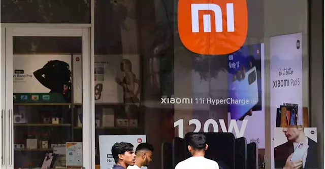 China's Xiaomi says it will protect its business interests after India freezes its assets