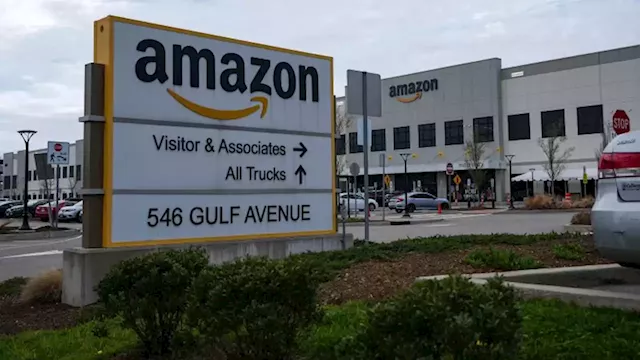 Amazon suspends 50 workers who refused to work after warehouse fire | CNN Business