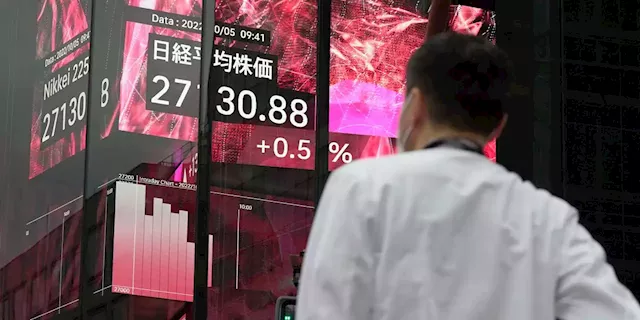 Hong Kong stocks lead Asia higher with 5% surge in catchup move to Wall Street; New Zealand hikes interest rates