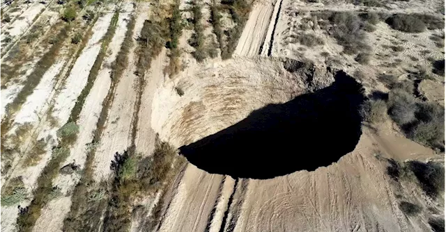 Chile files charges against mining company for giant sinkhole