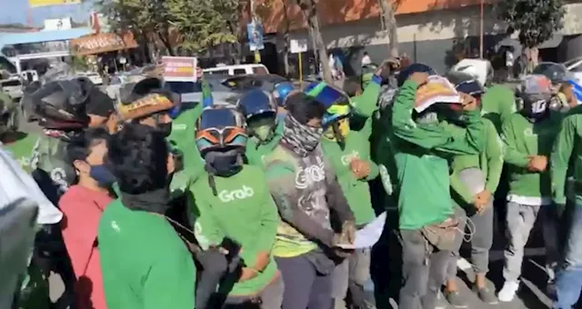 Grab drivers in Cebu stage protest on ‘pay cuts’, app company responds