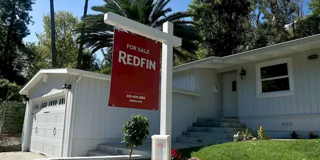 Redfin Shuts Home-Flipping Business, Lays Off 13% of Staff in Slumping Housing Market