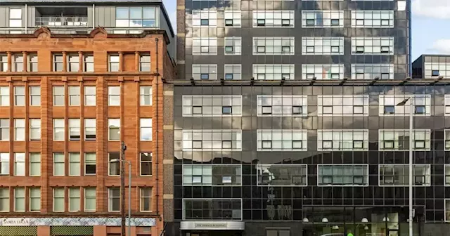 Flat in iconic Glasgow building complete with genius space-saving bedroom hits the market