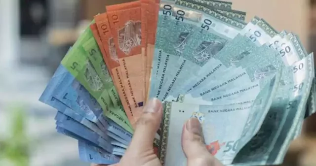 Malaysian ringgit, stocks down after inconclusive election