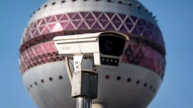 UK bans Chinese surveillance cameras from 'sensitive' sites | CNN Business