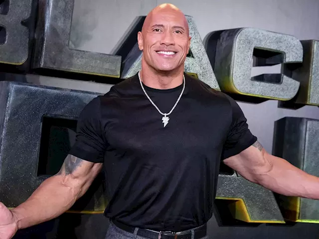 Dwayne Johnson visited a shop he used to steal Snickers bars from as a kid - and bought everyone's shopping | Business Insider