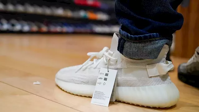 Adidas will continue to sell Kanye West's shoe designs without the Yeezy name | CNN Business