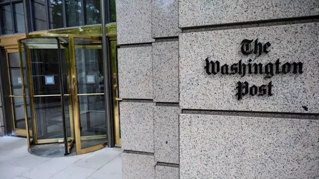 The Washington Post will conduct layoffs, its publisher says at contentious town hall | CNN Business