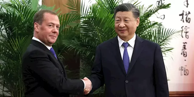 Ex-Russian president makes surprise trip to Beijing as Zelensky arrives in Washington | Business Insider