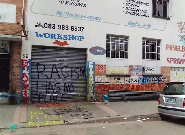 WATCH: 'Racists leave!' - Alleged Maselspoort attacker's business walls defaced by Azapo | The Citizen