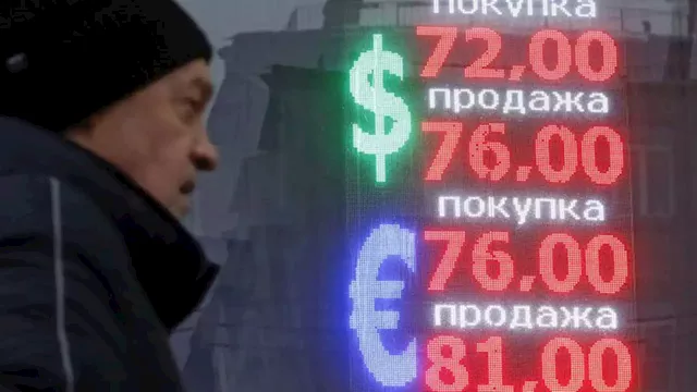 Ruble hits 8-month low against dollar, as falling oil prices and sanctions bite | CNN Business