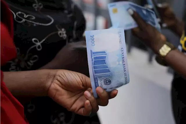 Nigerian naira drops to record low on official market, forwards ease