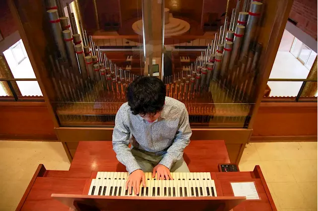 Rice business student has another calling, serving as a Woodlands congregation's organist