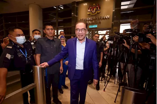 Anwar officially clocks in as Finance Minister