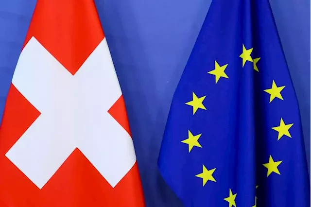 Swiss pledge no new business for Russians sanctioned by EU