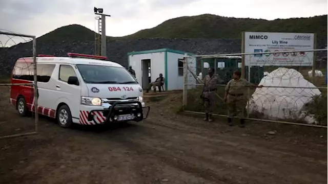 Families of trapped Lily Mine workers pay tribute outside the mine, six years on - SABC News - Breaking news, special reports, world, business, sport coverage of all South African current events. Africa's news leader.