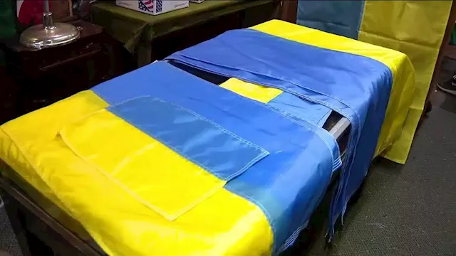 Old City flag shop searching for sewers to help business keep up with demand for Ukrainian flags