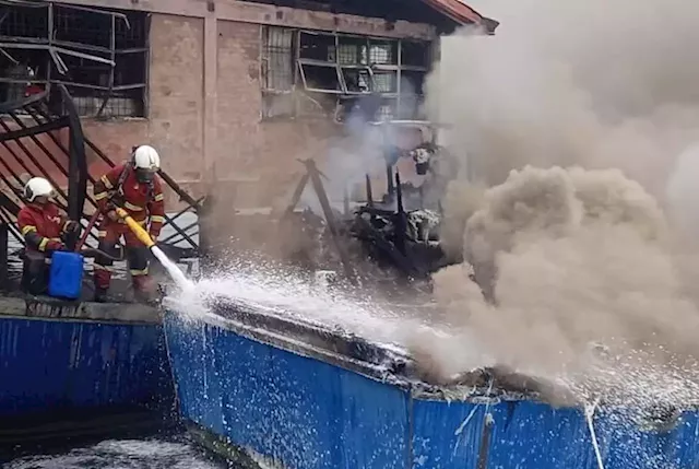 Two fishing boats, sundry shop gutted by fire at KK market jetty