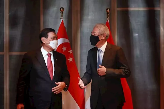 S'pore, Indonesia ink climate change partnership to pursue goals, including green finance