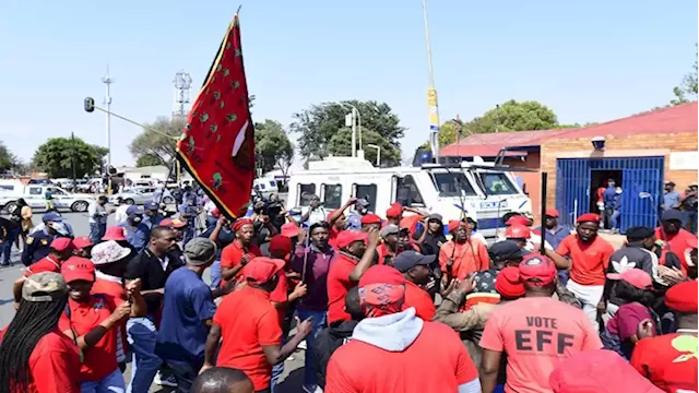 EFF members accompany an elderly man to open criminal case against Operation Dudula leader - SABC News - Breaking news, special reports, world, business, sport coverage of all South African current events. Africa's news leader.