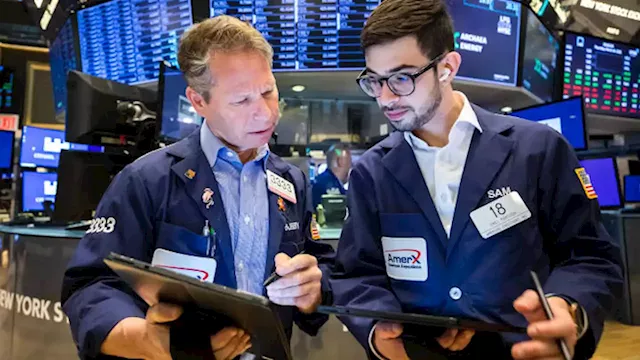 Dow rallies 300 points, Nasdaq gains 1.9% as chip stocks lead market rebound