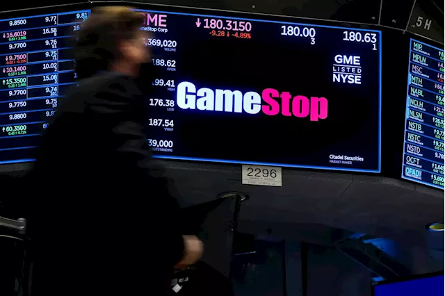 Stocks Making the Biggest Moves Midday: GameStop, Uber, Nielsen Holdings and More