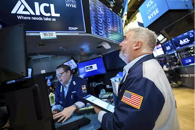 Stocks end another bumpy day lower and crude oil prices ease