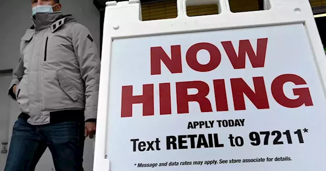 Job market still chugging even as economic risks grow