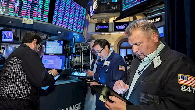 Stocks cut gains as oil tops $100 per barrel