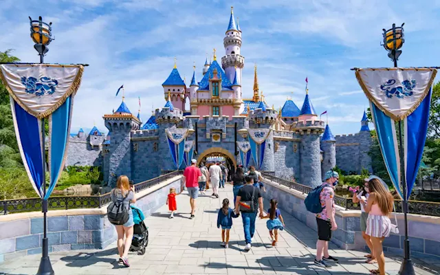 Fury over company scheme giving free Disneyland trip after 300 years' work