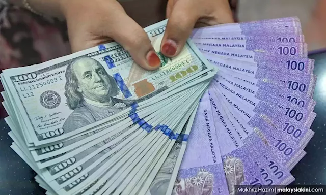 Ringgit touches near two-year low, Asian stocks track Wall St strength