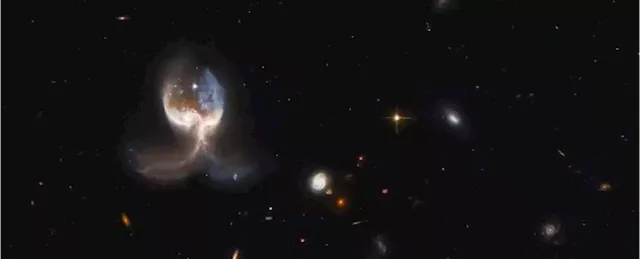 This Terrifying Space Angel Is Actually a Merger of Two Colossal Cosmic Objects