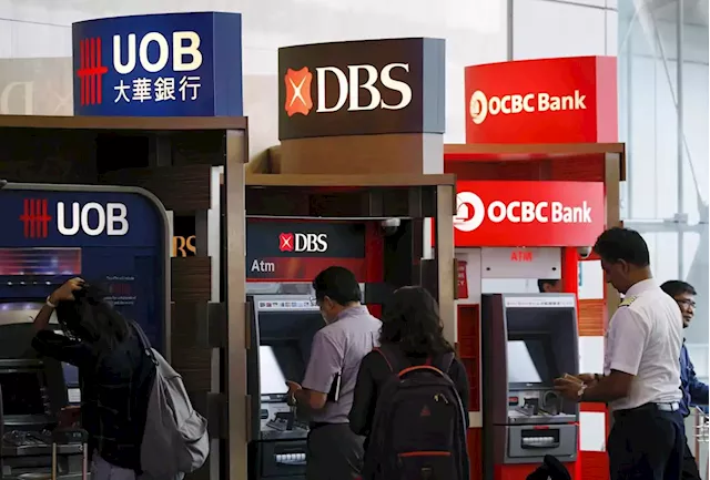 DBS, OCBC shares climb after earnings beat forecasts; UOB slips