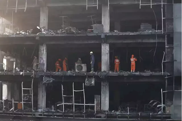 Building fire kills 27 in New Delhi, police arrest company owners