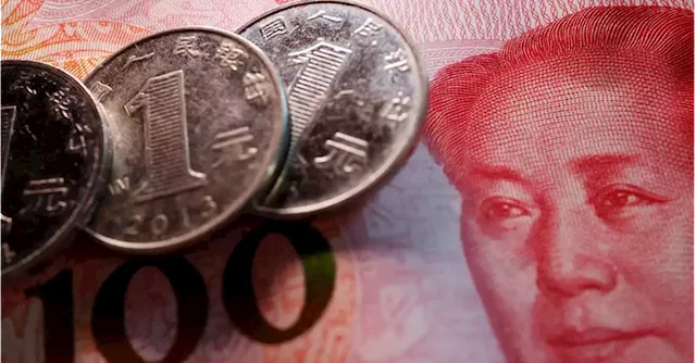 Investment banks rush to cut yuan forecasts again after April revisions