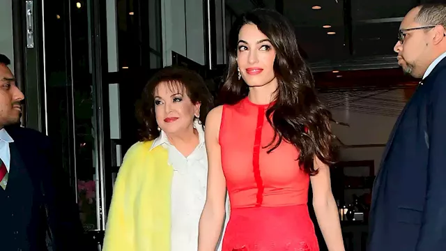 Amal Clooney Swaps Business Casual For A Little Red Dress