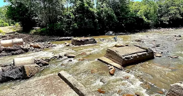 Sabah community leader urges Public Works Dept, concession companies to rebuild flood-damaged bridge at Kampung Mendulong | Malay Mail