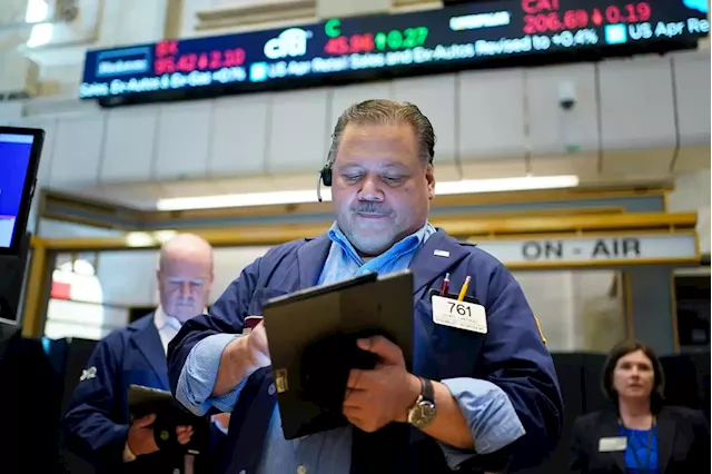 Stocks tumble, with Dow falling 700 points, erasing post-Fed rally