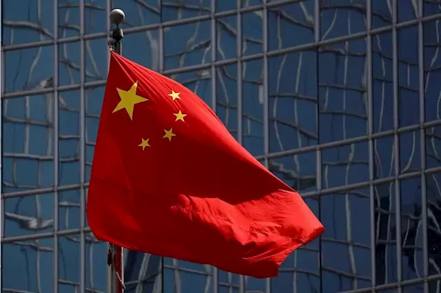 China further reins in business activities of senior government officials' families