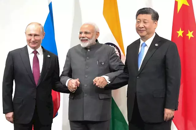 Business Maverick: India to resist anti-US messaging at BRICS summit with Xi, Putin