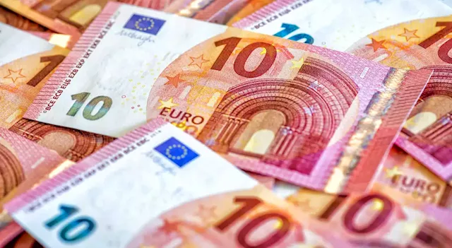 Business Maverick: Euro clings to parity with dollar as markets await US inflation data